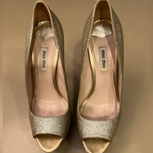 Miu Miu Gold platform heels
